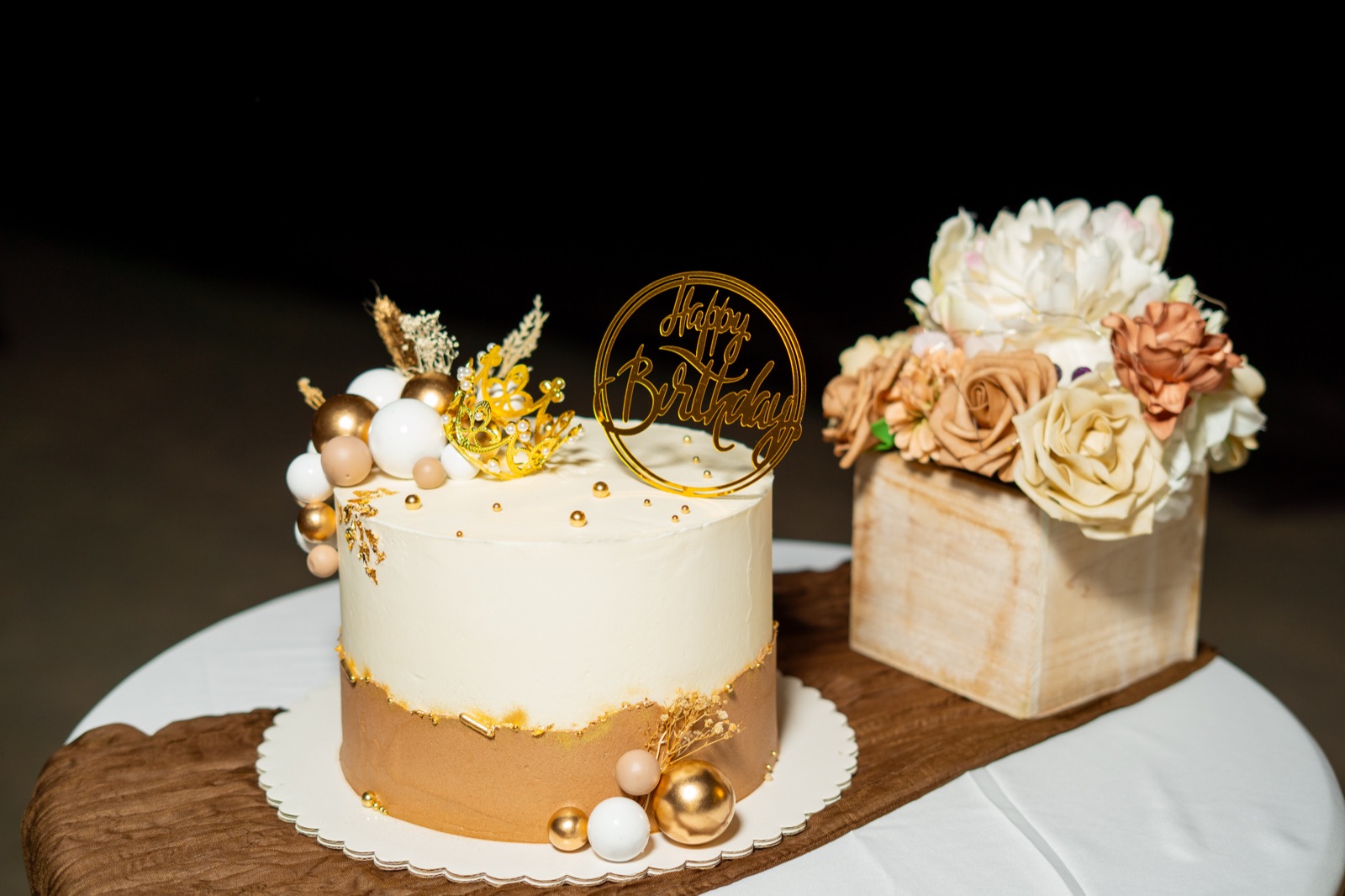 Custom celebration cake with gold detailing